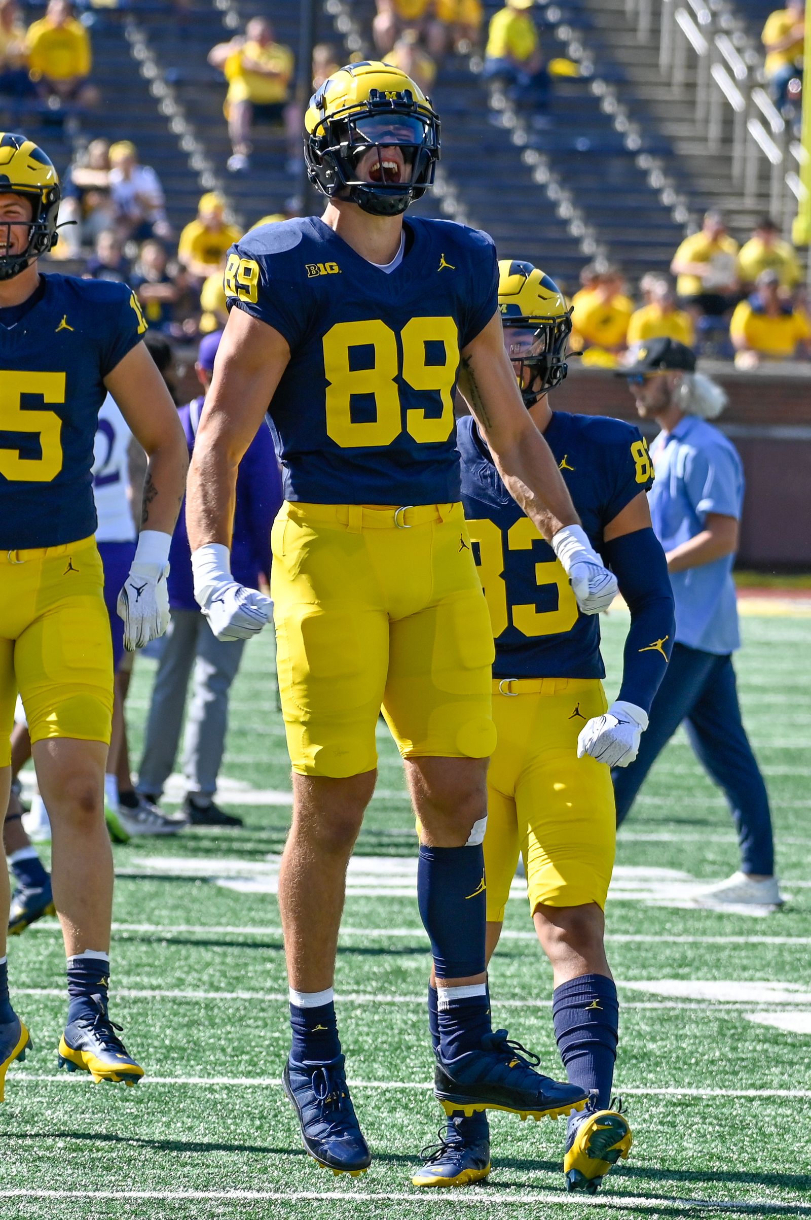 AJ Barner with the Michigan Wolverines before a September 2023 game at Michigan Stadium.
