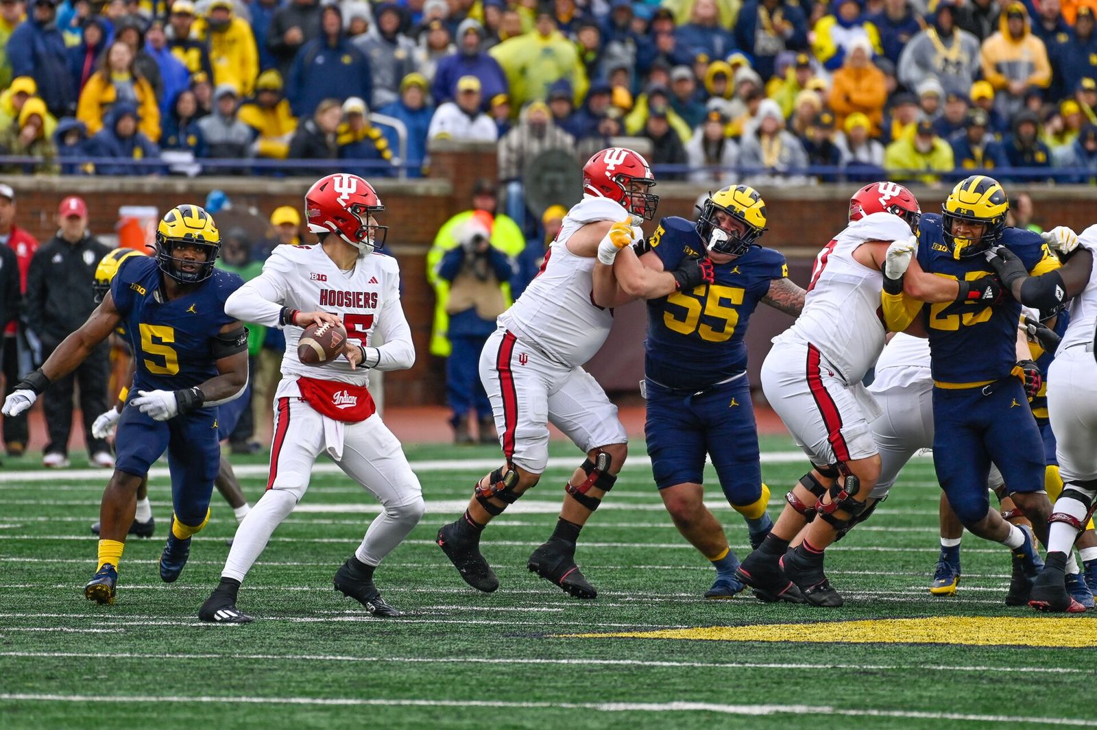 Brendan Sorsby drops back to pass for the Indiana Hoosiers during an October 2023 game at Michigan Stadium.