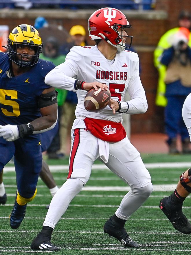 Brendan Sorsby drops back to pass for the Indiana Hoosiers during an October 2023 game at Michigan Stadium.