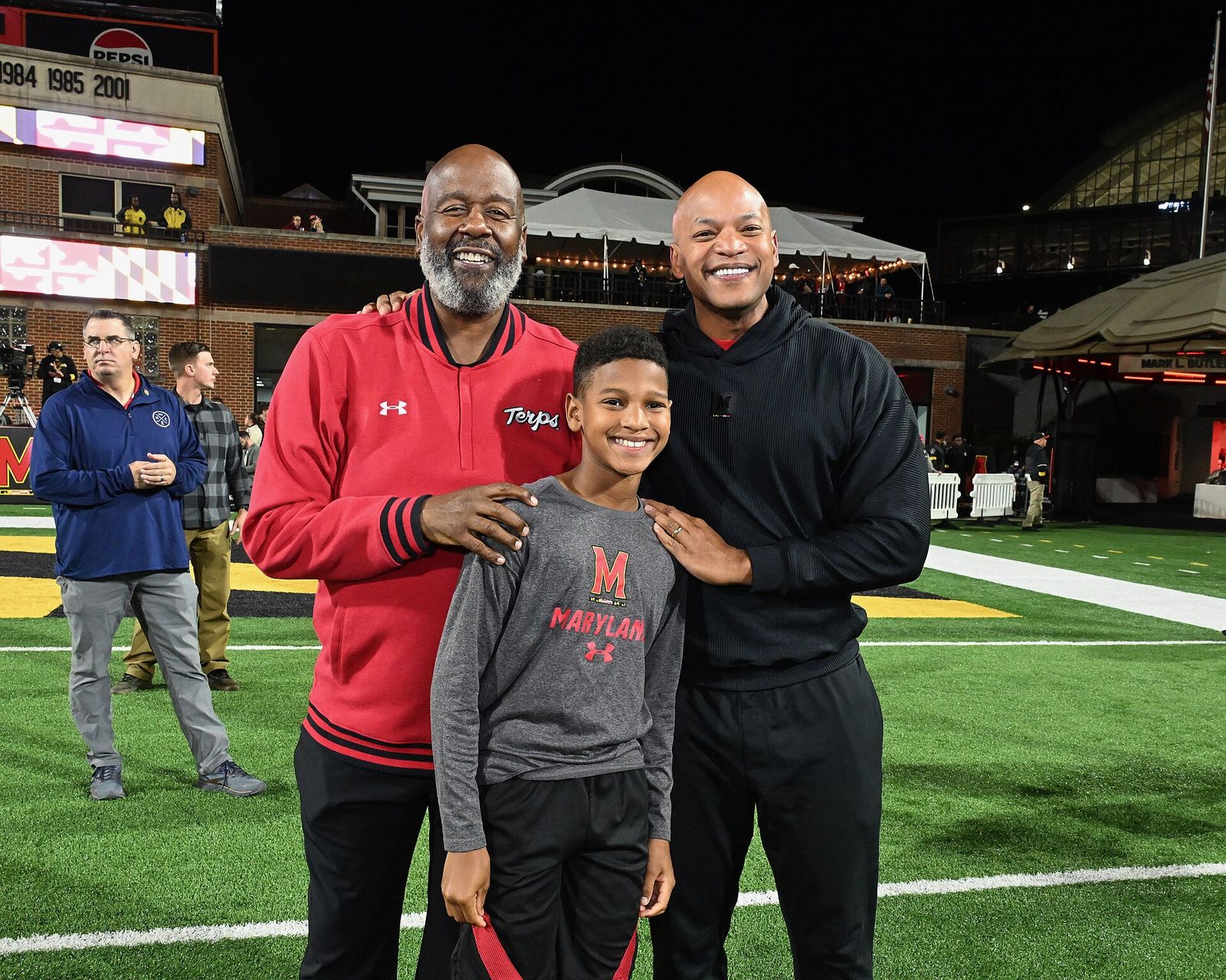 Governor Moore enjoys the NCAA Football game Maryland v Northwestern by Joe Andrucyk at SECU Stadium, 90 Stadium Dr, College Park MD 20742