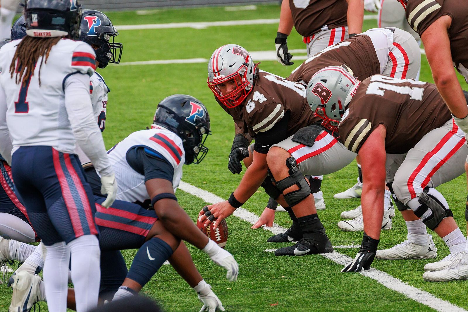 Brown Bear Charlie Hines exchanges words with Penn player. Penn Quakers at Brown Bears football (November 2, 2024)