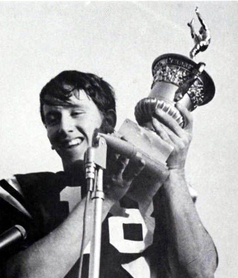 Manning with the trophy won