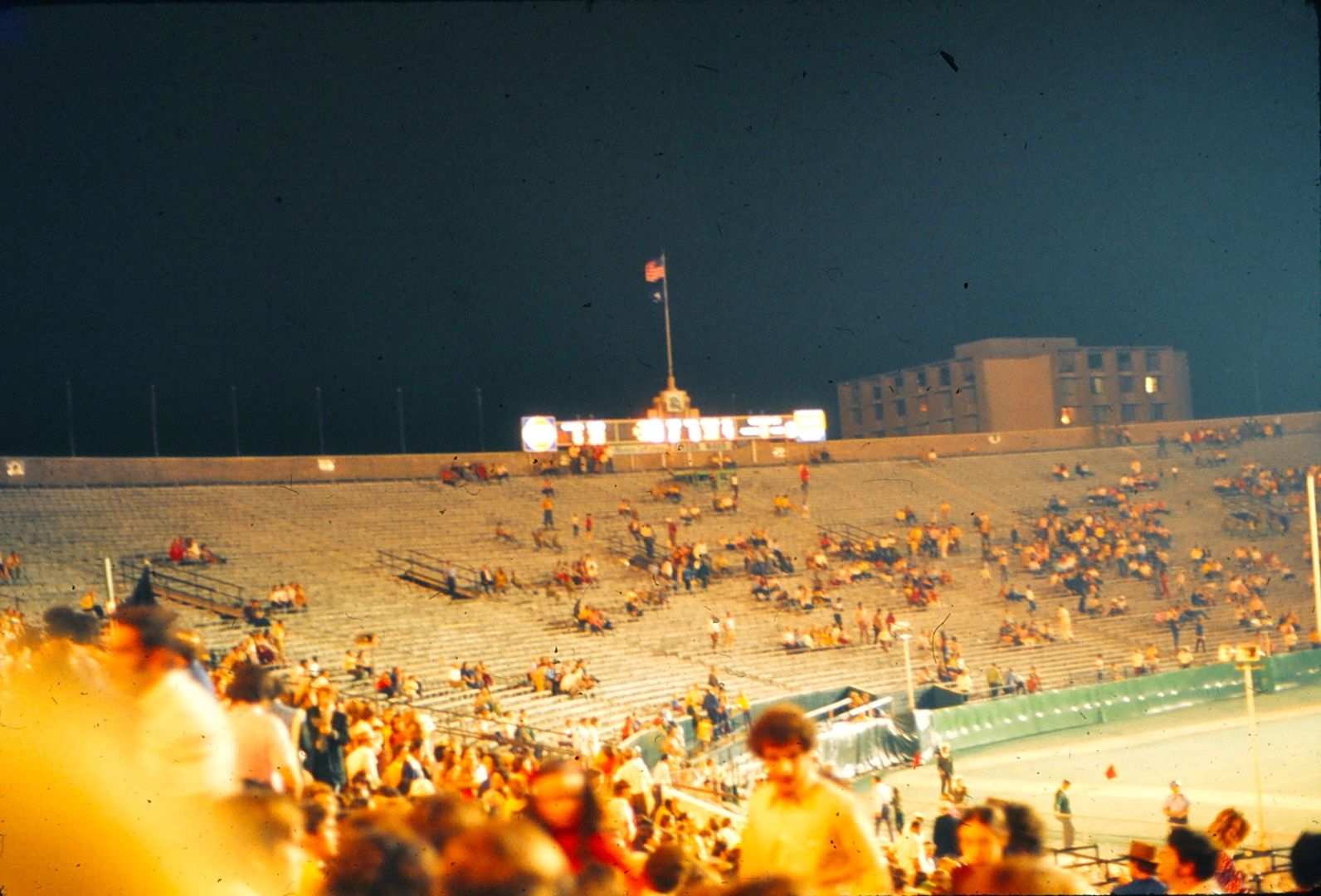 Inside Tulane Stadium, New Orleans, October 1972. View looking riverwards, towards scoreboard. Highrise of Butler Dorm across Willow Street visible at right.