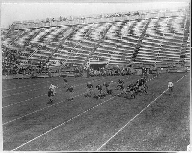 Yale Univ. football scenes, ca. 1911: end run during Wesleyan game
