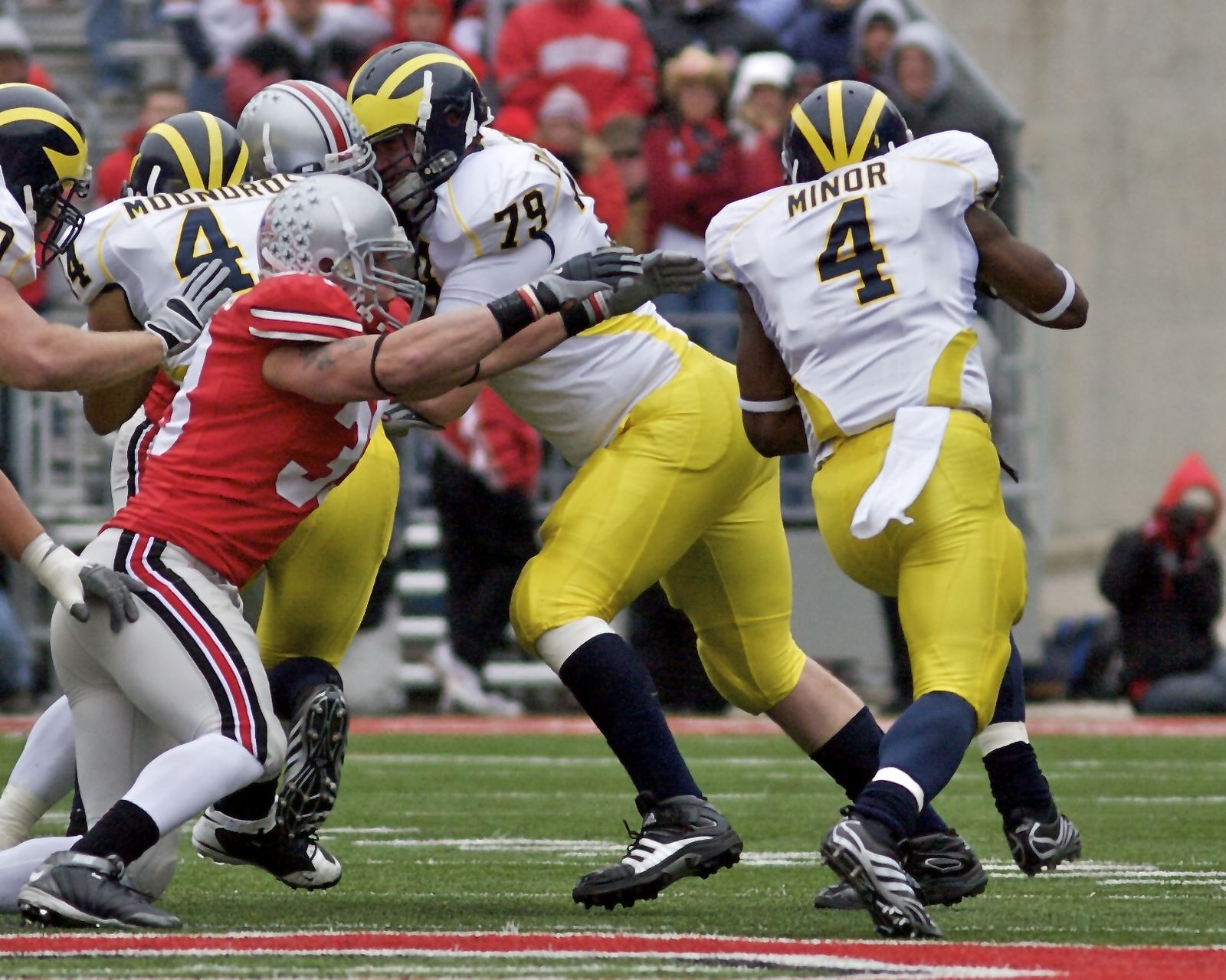 Brandon Minor eludes James Laurinaitis during the 2008 Michigan – Ohio State rivalry game