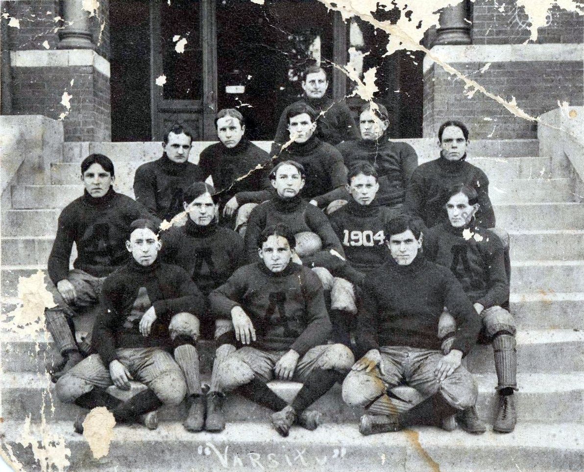 1904 Auburn football team; head coach Mike Donahue is in the second row with "1904" on his jersey